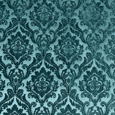 a blue and black wallpaper with an ornate design on it's surface,