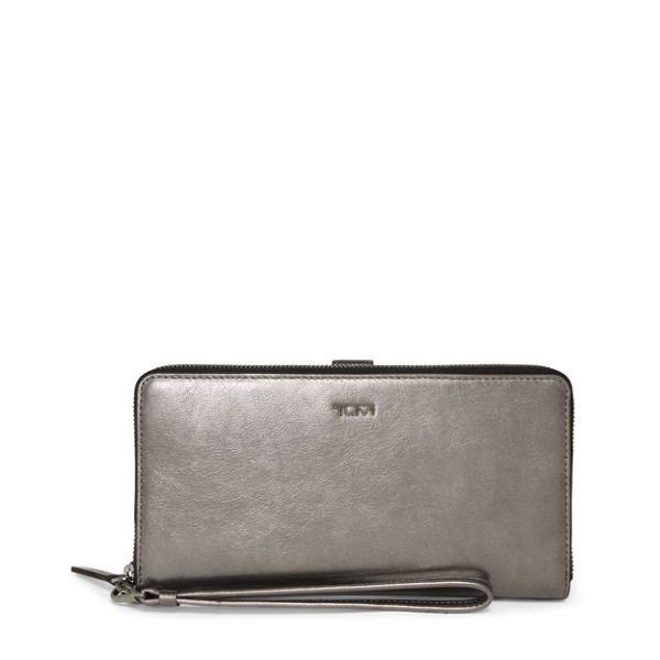 Both elegant and practical, this travel wallet features dedicated document and passport slots, as well as 10 additional card slots and a wristlet for easy carrying. Modern Silver Wallet With Card Slots, Luxury Silver Wallet For Travel, Silver Bifold Wallet For Formal Occasions, Luxury Silver Travel Wallet, Silver Wallet With Card Slots For Daily Use, Classic Silver Wallet For Formal Occasions, Elegant Silver Bags With Card Slots, Modern Silver Rectangular Wallet, Silver Bifold Wallet With Card Slots