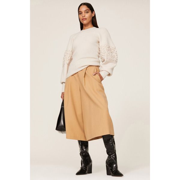 Off-white knit (64% Wool, 26% Polyamide, 9% Cashmere, 1% Elastane). Sweater. Mock neck. Long sleeves. Pull on. 24.5" from shoulder to hemline. Imported. White Knit Top For Work In Winter, Spring Workwear Fine Knit Sweater, White Long Sleeve Knit Top For Work, Chic Sweater For Workwear In Spring, Chic White Sweater For Workwear, Chic White Sweater For Work, Spring Fine Knit Sweater For Work, Beige Long Sleeve Knit Top For Work, White Textured Knit Top For Workwear