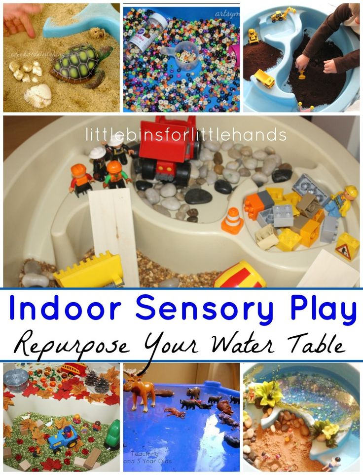 an indoor play area with toys and water table for toddlers to play in it