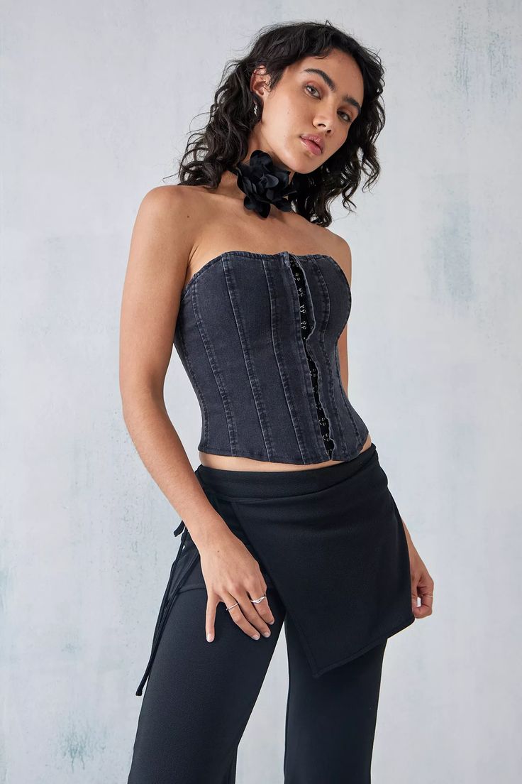 Structured boning corset by BDG. True 00s-styling crafted from a denim fabrication with a sleeveless and strapless silhouette, a structured boning bodice and cut-out hem. Complete with a hook-and-eye closure to front and lace-up to reverse. Only at UO. 00s Style, Boned Corsets, Academia Fashion, Dark Academia Fashion, Denim Corset, Women Corset, Corset Top, Black Fits, Black Denim