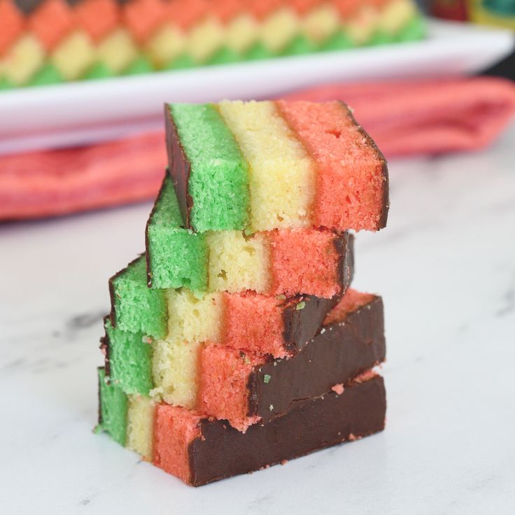 rainbow cookies stacked on top of each other