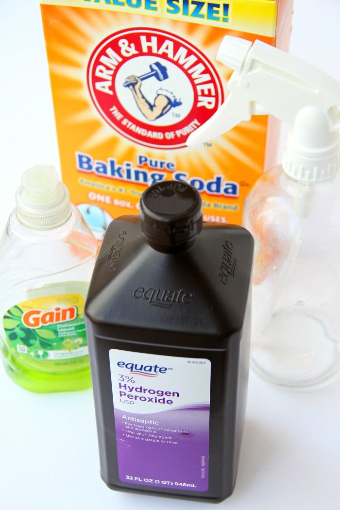 the ingredients for baking soda are displayed on a white surface, including detergent and dishwasher soap