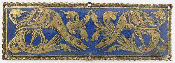 an ornately decorated blue and gold plaque