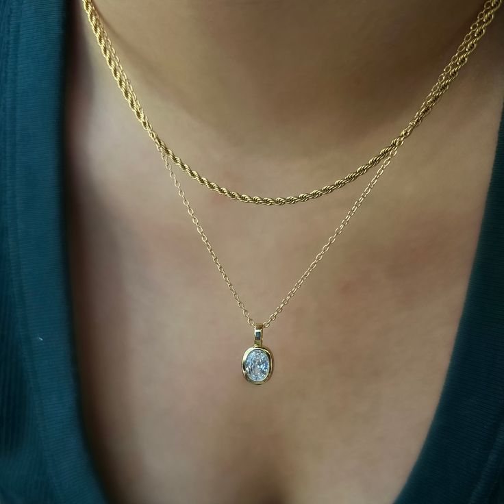 Look no further than our beautiful Romi Necklace to bring some glamour to any ensemble! This dainty yet chic piece features a stunning gem pendant, so you can shine wherever you go. Shine on, gorgeous! Evry Jewels, Gem Pendant, Tiny Necklace, نظارات شمسية, Oval Pendant, Oval Stone, Shine On, Cz Stone, Silver Necklaces