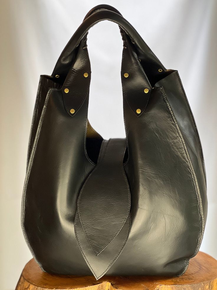 Large Black Magnolia Hobo Bag with brass studs. Hobo Bag, Large Black, Purses And Handbags, Magnolia, Shoulder Bags, Art Inspiration, Matter, Brass, Shoulder Bag