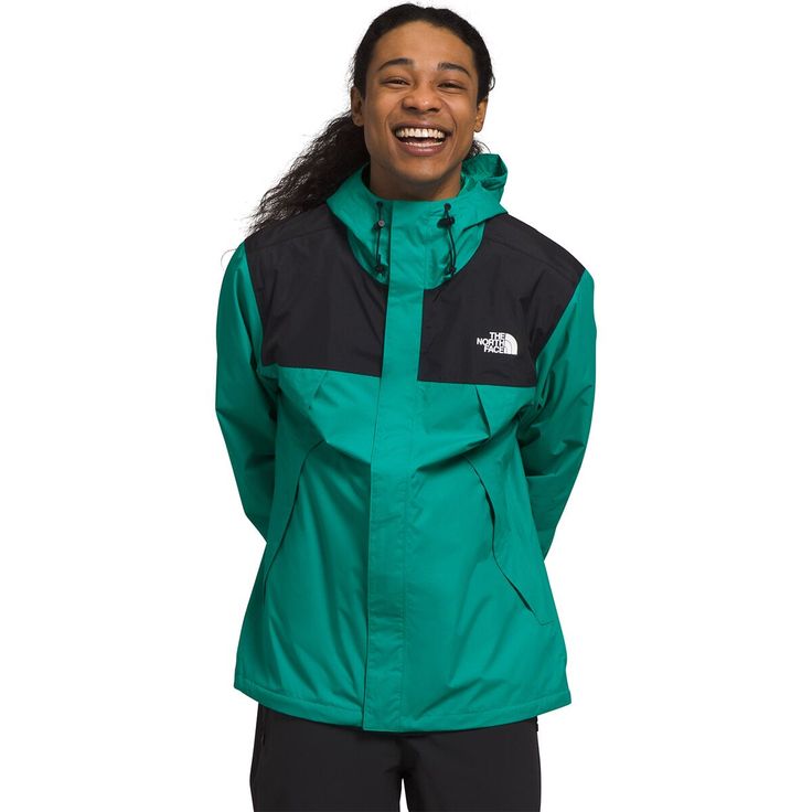 When rain threatens our day at the crag or the finishing miles of our hike, we are lucky to have The North Face's Antora Jacket. This jacket uses a waterproof membrane to block moisture and rain while we bag peaks, work on a sheltered granite problem, or enjoy a concert in the rain. Green Nylon Raincoat For Hiking, Green Weatherproof Raincoat For Hiking, Green Weatherproof Outerwear For Camping, Durable Functional Raincoat For Outdoor Activities, Green Weatherproof Windbreaker For Rainy Weather, The North Face Green Functional Outerwear, Functional Green Outerwear By The North Face, Green Waterproof Sporty Raincoat, Green Sporty Outdoor Raincoat