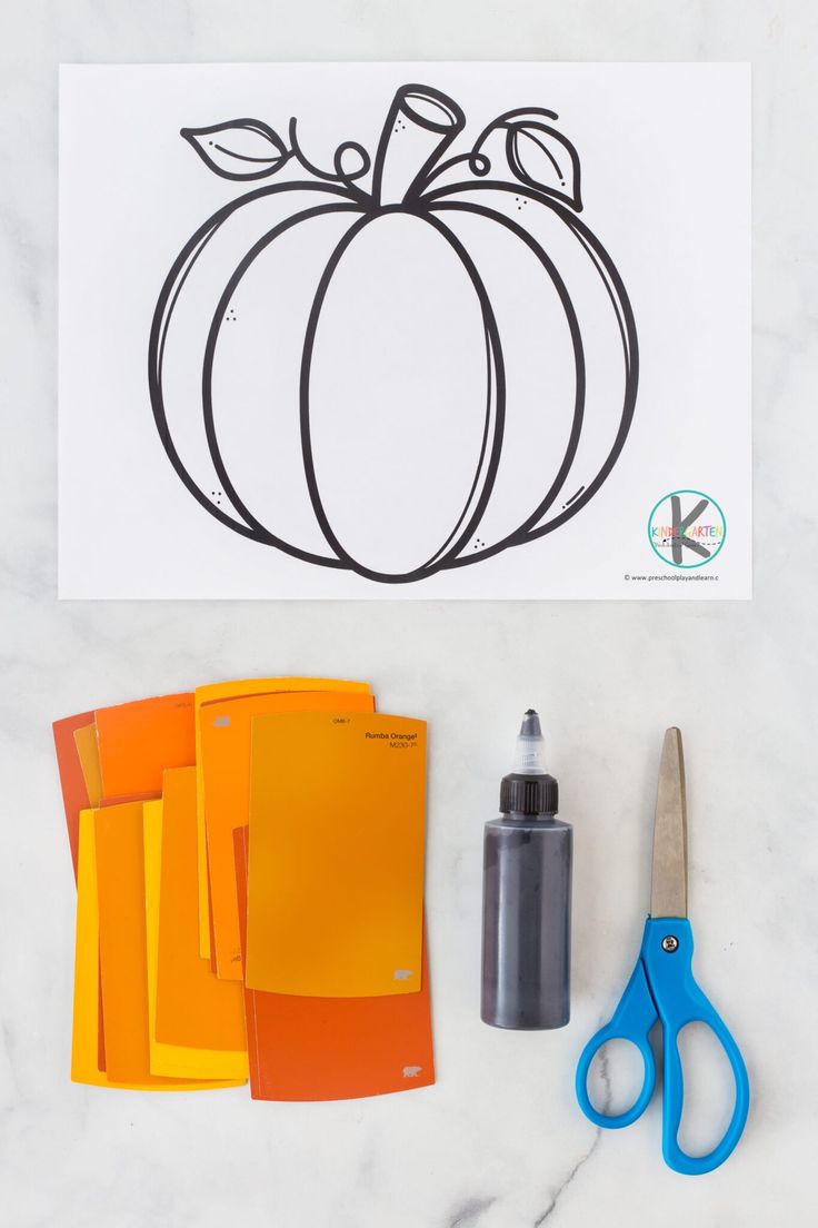 the supplies needed to make this pumpkin craft include scissors, glue, and construction paper