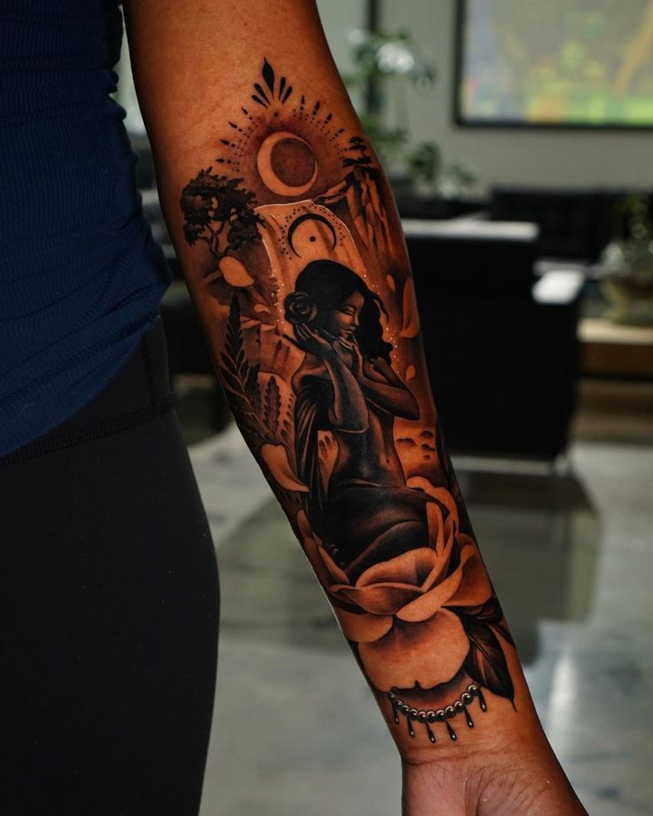 a woman's arm with a tattoo on it and a clock in the background