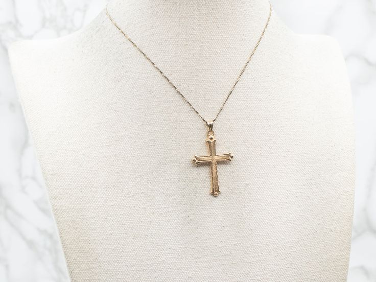 This exquisite yellow gold cross pendant is finely textured for a luxurious look. Crafted with intricate detail, it makes an elegant statement of your faith. Perfect for formal or casual wear.This pendant does not come with the chain shown. Please feel free to contact us, we will help you find the perfect chain for your style and budget!Metal: 14K Yellow GoldMeasurements: 23 x 40 mm, with bail 14k Gold Diamond Cut Cross Necklace, Elegant Cross Necklace For Formal Occasions, Luxury Crucifix Cross Necklace For Formal Occasions, Elegant Formal Cross Necklace, Gold Cross Necklace With Figaro Chain, Yellow Gold Filigree Cross Pendant Necklace, Yellow Gold Cross Jewelry With Figaro Chain, 14k Gold Cross Figaro Chain Jewelry, Luxury Diamond Cut Cross Pendant Necklace