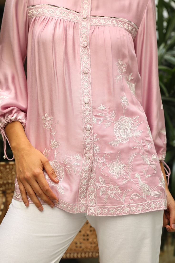 PRODUCT DETAIL: Introducing our "Pink Embroidered Top with White Linen Pants" - crafted from soft fabric and adorned with delicate lacework and embroidery, this cute top is perfect for the summer season. Pair it with denims or white pants for a stylish and effortless look. SPECIFICATIONS: Color Pink Fabric Modal Cotton Elegant Summer Top With Chikankari Embroidery, Elegant Summer Chikankari Embroidered Top, Elegant Chikankari Embroidered Top For Summer, Pink Embroidered Feminine Blouse, Feminine Spring Tops With Chikankari Embroidery, Summer Embroidered Feminine Blouse, Summer Feminine Embroidered Blouse, Feminine Embroidered Summer Blouse, Feminine Chikankari Embroidered Tops For Spring