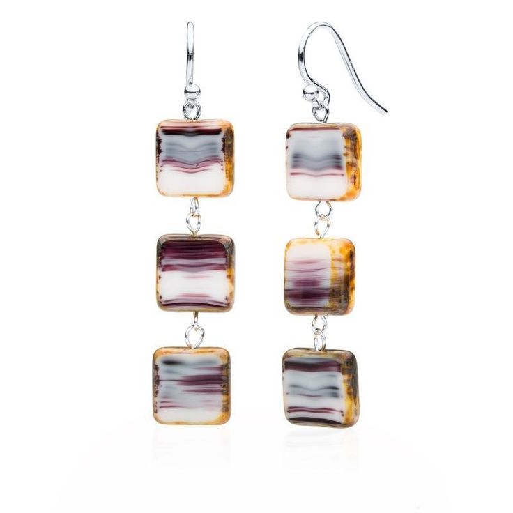 Immerse yourself in the allure of European artistry with our 'Picasso Windows' Triple Glass Tile Earrings – a true masterpiece that effortlessly blends style and comfort. Crafted from richly colored glass sourced from the Czech Republic, these earrings boast three tiles, each named for their painted edges and window shape. These super-lightweight earrings redefine elegance with a sterling silver ear wire, providing a seamless and luxurious finish. With an approximate 2 1/4-inch drop, they make a Pearl Necklace Classic, Tile Earrings, Birthstone Stacking Rings, Glass Drop Earrings, Freshwater Pearl Jewelry, Genuine Leather Totes, The Czech Republic, Crystal Hoop Earrings, Beaded Drop Earrings