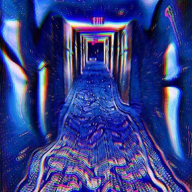 an abstract image of a hallway with blue and pink colors