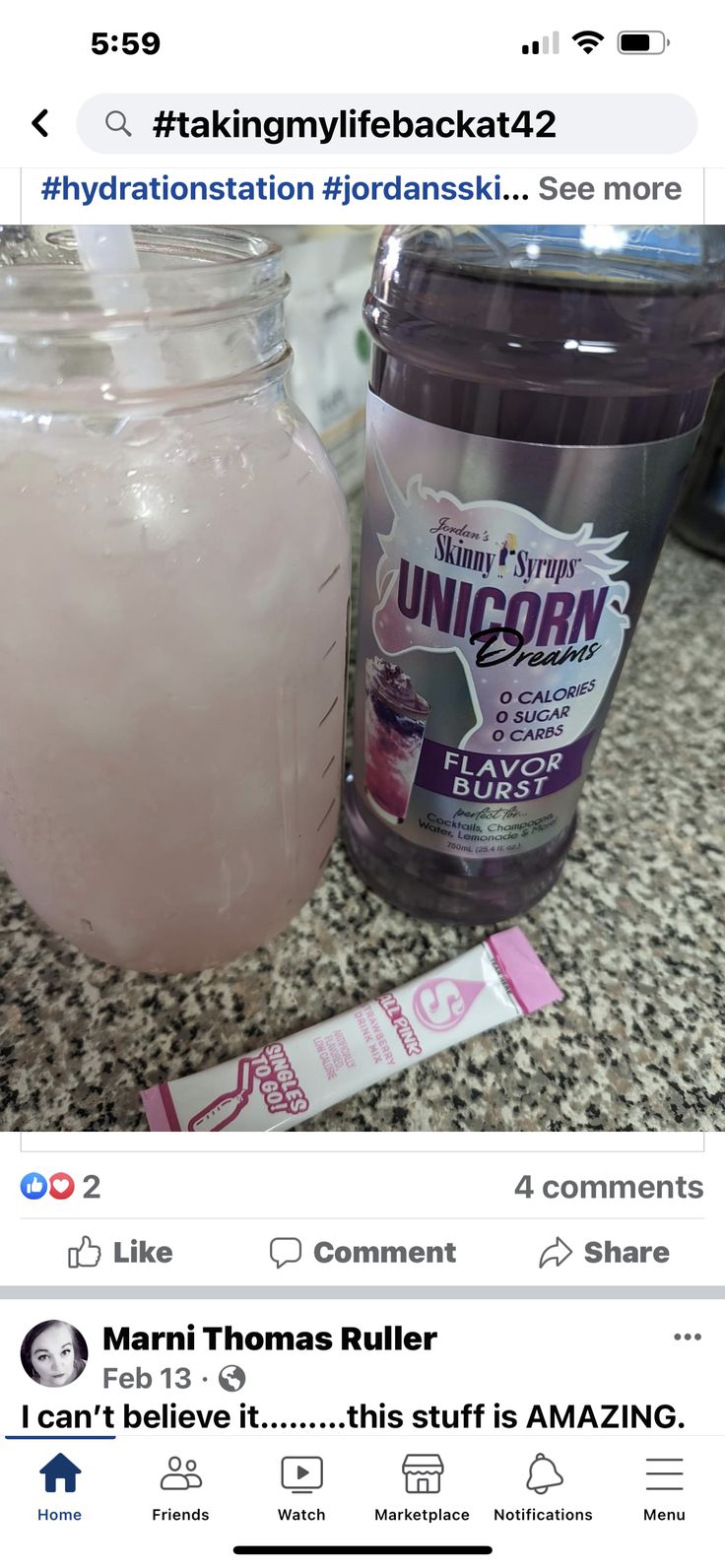 a jar of pink liquid next to a plastic container with the word unicorn on it