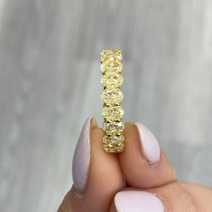 Fancy Yellow Oval Diamond Eternity Band VS-VVS Clarity Handmade in NYC Set in 18K Yellow Gold Available from 4 to 7 carats total. Ready to ship in 2-3 weeks Luxury Yellow Gold Ring Jewelry, Yellow Diamond Band, Canary Diamond Wedding Band, Yellow Diamond Wedding Band, Fancy Yellow Diamond Ring, Fancy Diamond Ring, Canary Diamond, Ring Cuts, Curated Wedding