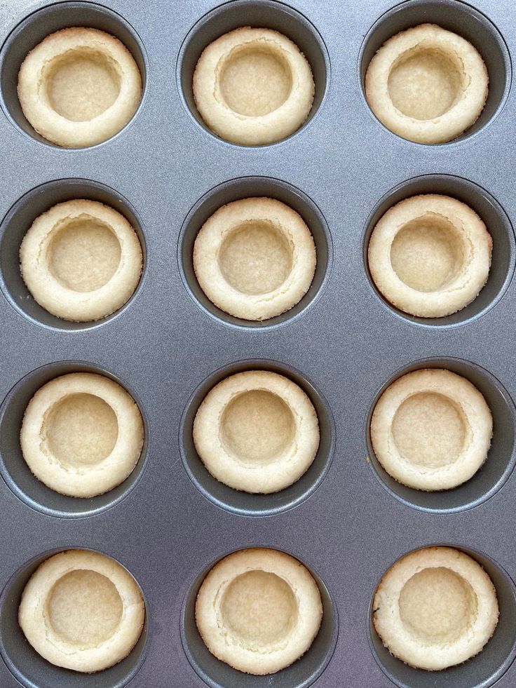 the muffins are ready to be baked and put in the pan for baking