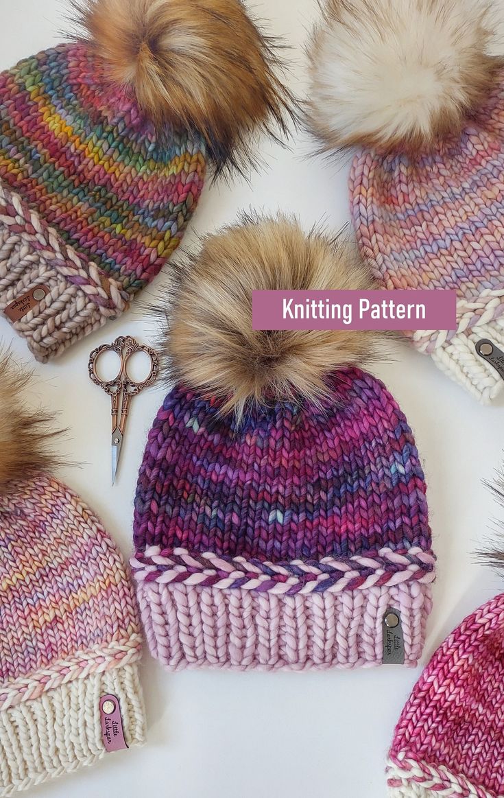 knitted hats with fur pom - poms and scissors on the top one