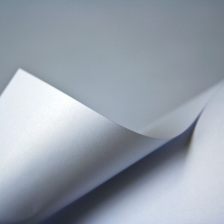 a sheet of white paper folded in half