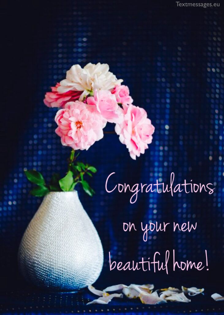 pink flowers in a white vase with congratulations on your new beautiful home