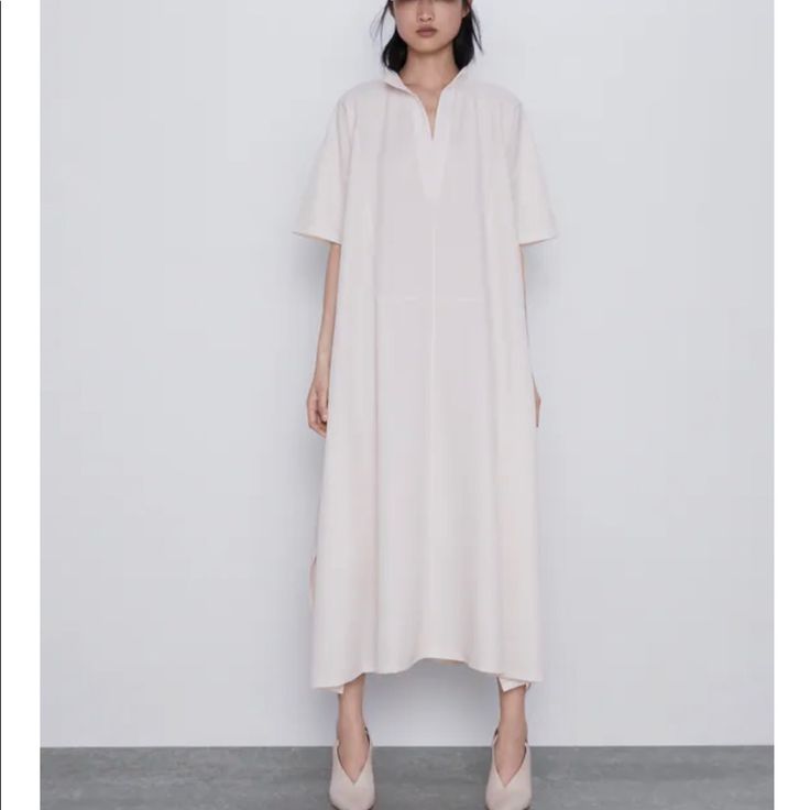 Nwt Zara Oversized Shirt Dress. Lightweight Material. Labeled Xs-S Oversized V-neck Midi Dress For Daywear, Oversized Midi Shirt Dress For Summer, Oversized Midi Length Shirt Dress For Summer, White Oversized Casual Shirt Dress, Oversized White Shirt Dress For Spring, White V-neck Shirt Dress With Relaxed Fit, Casual White Oversized Shirt Dress, Casual White Maxi Shirt Dress, Oversized Tunic Midi Dress