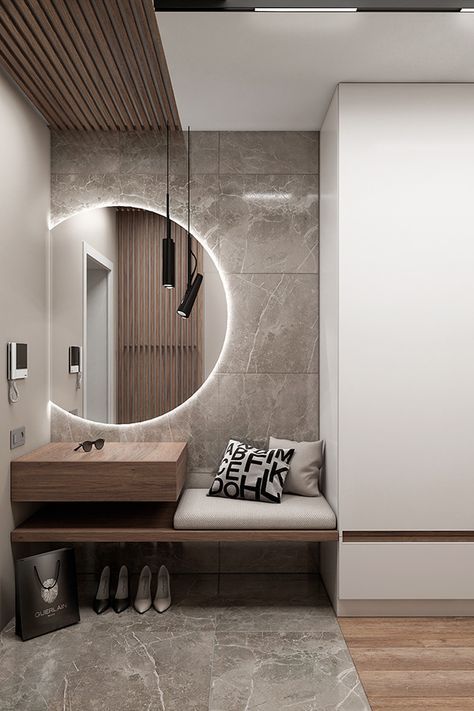 a modern bathroom with a bench and mirror