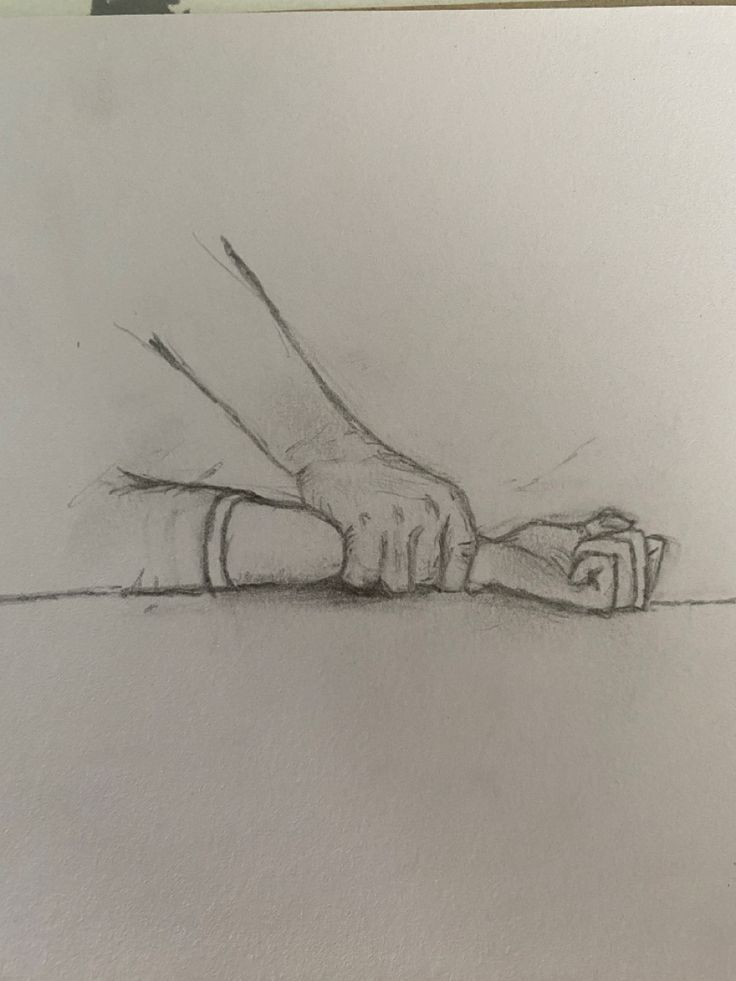 a pencil drawing of two hands touching each other