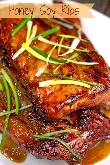 honey soy ribs on a plate with garnishes