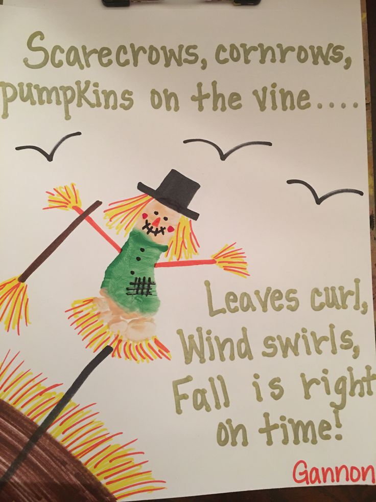 a sign with a drawing of a scarecrow on it