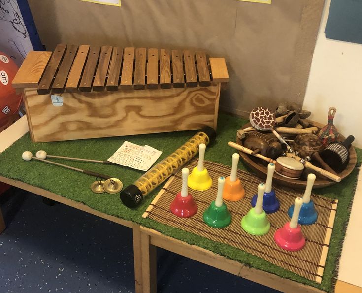 an assortment of musical instruments on display in a room