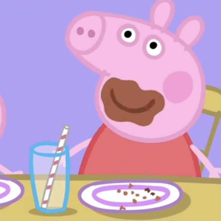 peppa pig sitting at a table with two plates and a drink in front of him