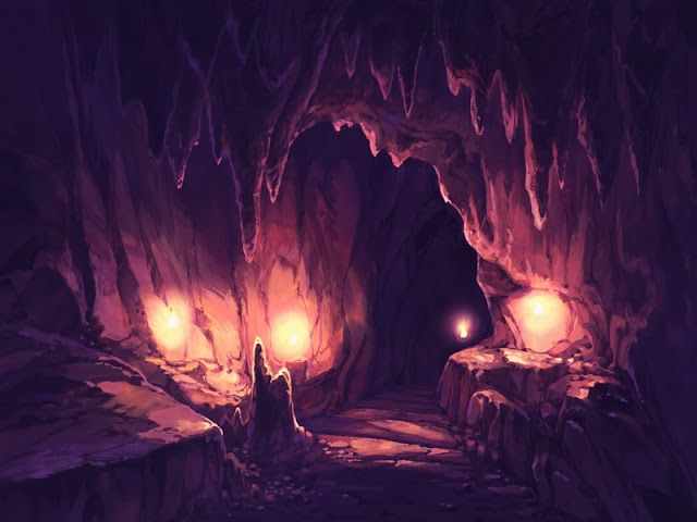 an underground cave with several lights in the entrance and some rocks on either side that have been carved into it