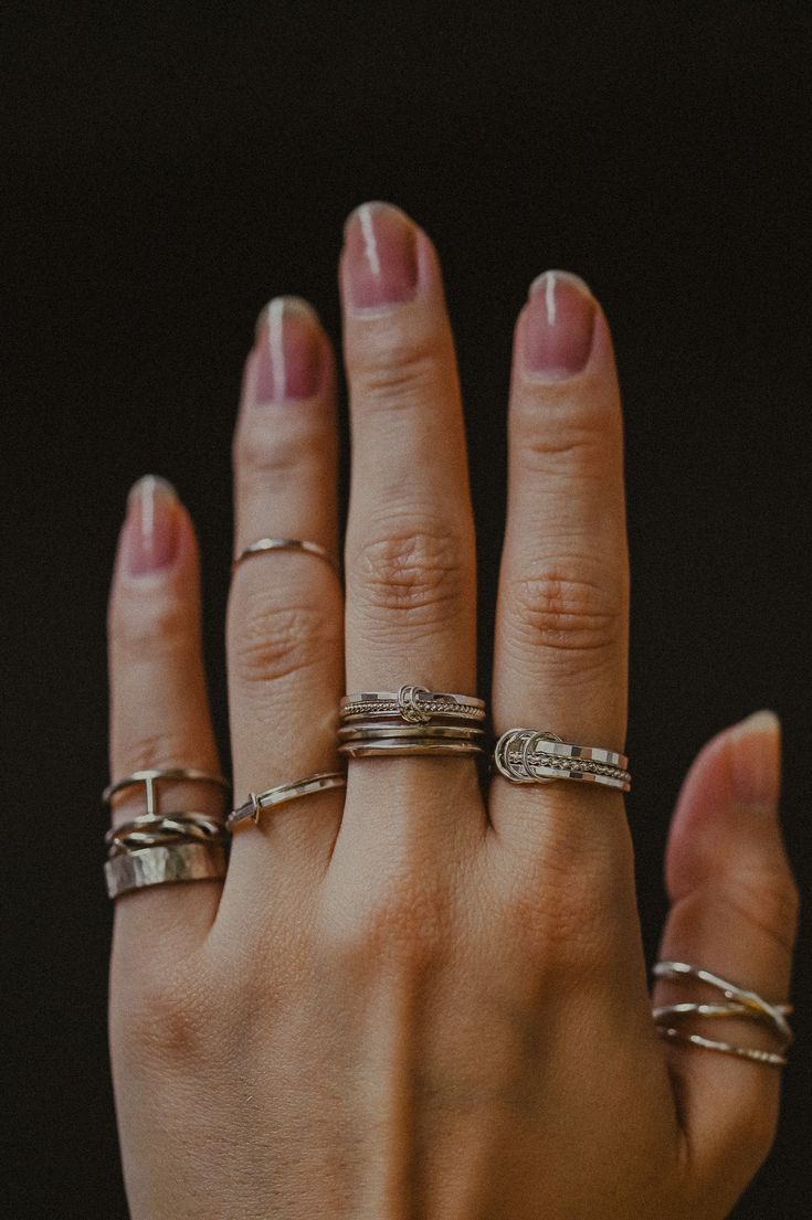 This is a gorgeous, unique ring set made up of three individual rings that are permanently linked together. All of the rings move independently of each other and are so fun to fidget with! The three links holding the pieces together are so satisfying to play with, too - you'll want to spin, flip and roll this ring all day long! The entire Link Ring collection makes perfect stacking rings when worn with other pieces. Did we mention the gorgeous texture combination? The extra thick ring paired wit Metal Jewelry With Ring Detail And Modern Twist, Modern Metal Jewelry With Ring Detail, Modern Twist Silver Stackable Midi Rings, Silver Stackable Midi Rings With A Modern Twist, Sterling Silver Stacked Promise Rings, Unique Stackable Rings For Everyday, Adjustable Stacked Silver Rings, Everyday Silver Stacked Rings, Everyday Stacked Silver Rings