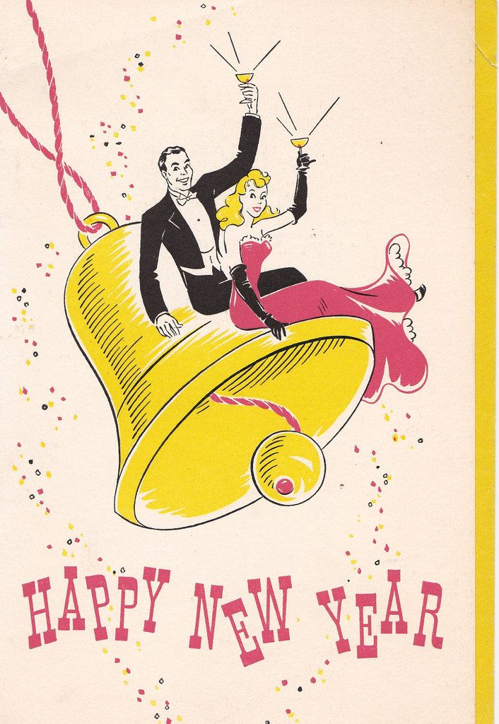 a man and woman riding on the back of a yellow bell with confetti