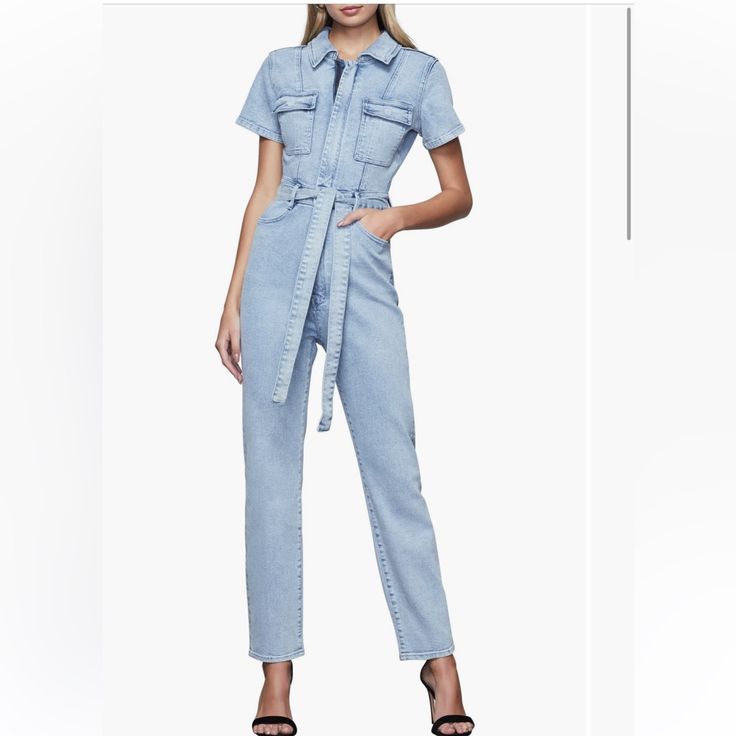 Update Your Street-Ready Style In This Light-Wash Jumpsuit Designed With An Edgy Front Zip And A Waist-Defining Tie. 54 1/2" Length; 28" Inseam; 13" Leg Opening (Size 1) Front Zip Closure Spread Collar Short Sleeves Chest Flap-Patch Pockets; Front Scoop Pockets; Back Patch Pockets High Rise Jumpsuits For Workwear In Summer, High Rise Jumpsuits And Rompers For Summer Workwear, Fitted Blue Denim Jumpsuit With Belt, Fitted High Rise Jumpsuits For Workwear, Fitted High-rise Jumpsuits For Workwear, Good American Jumpsuit, Designer Jumpsuits, Good American, Back Patch