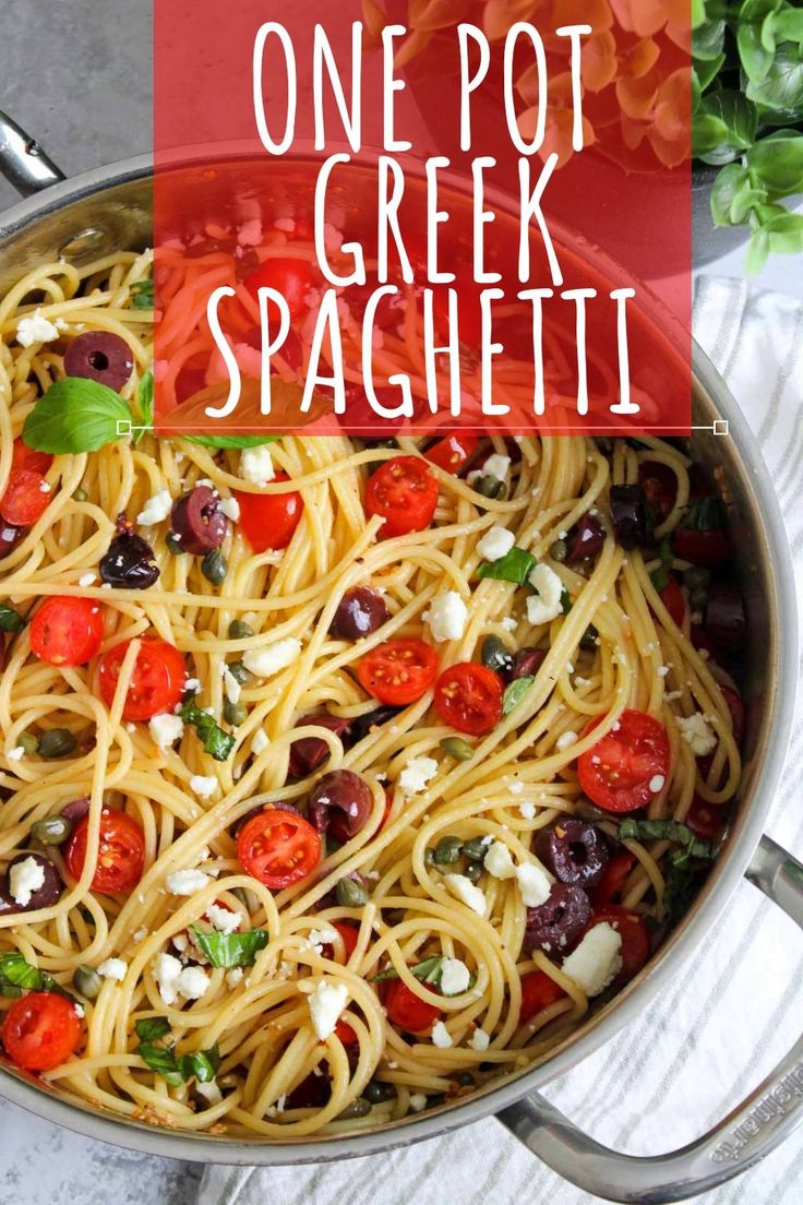 one pot greek spaghetti with tomatoes, olives and fettuccine in a pan