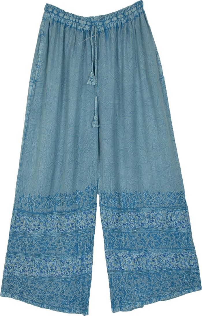 Free flowing stonewashed straight-leg pants are the perfect for any season. They impart effortless style with floral embroidery and floral patchwork in the same blue color and the rayon keeps you cool, the stonewashed look gives a unique style. #tlb #SplitSkirtsPants #Stonewash #Embroidered #Misses #Pocket #Summerpants #stonewashedpants #bluepants #blueembroideredpants Blue Embroidered Straight Leg Bottoms, Blue Straight Leg Pants With Floral Embroidery, Blue Straight Leg Bottoms With Floral Embroidery, Blue Floral Embroidered Wide Leg Bottoms, Bohemian Style Denim Blue Cotton Pants, Bohemian Denim Blue Cotton Pants, Spring Hippie Straight Leg Bottoms, Hippie Straight Leg Spring Bottoms, Hippie Style Straight Leg Spring Bottoms