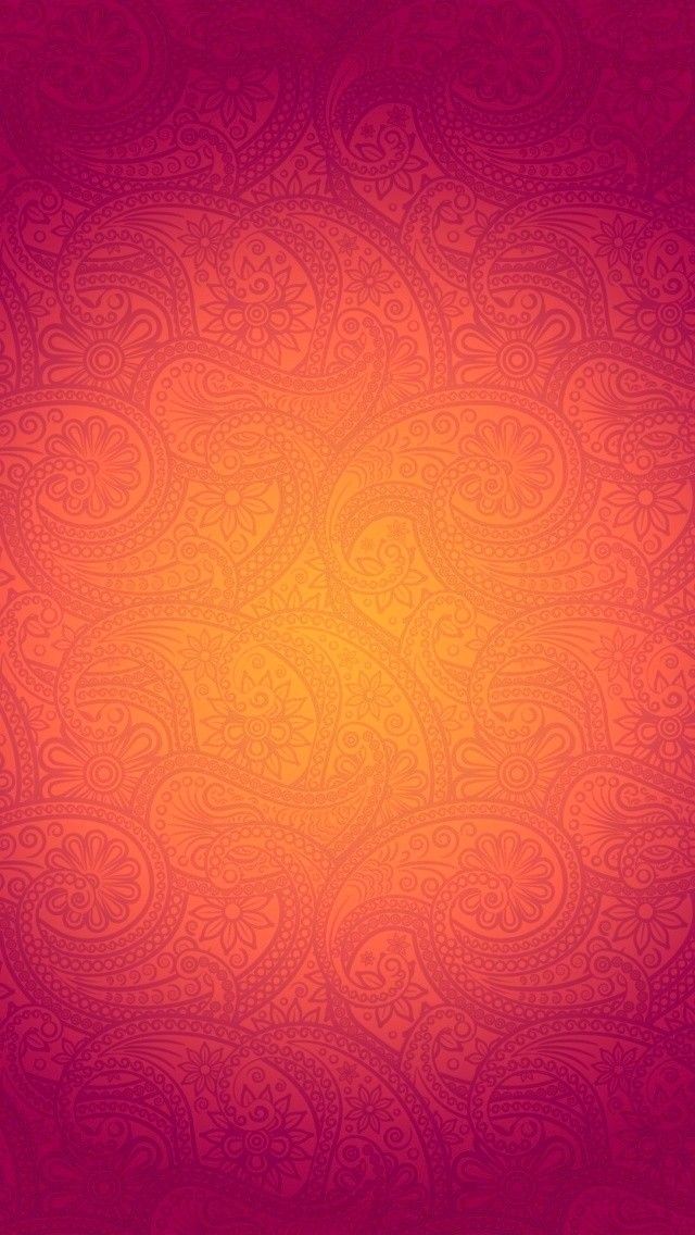 an orange and red background with paisley patterns