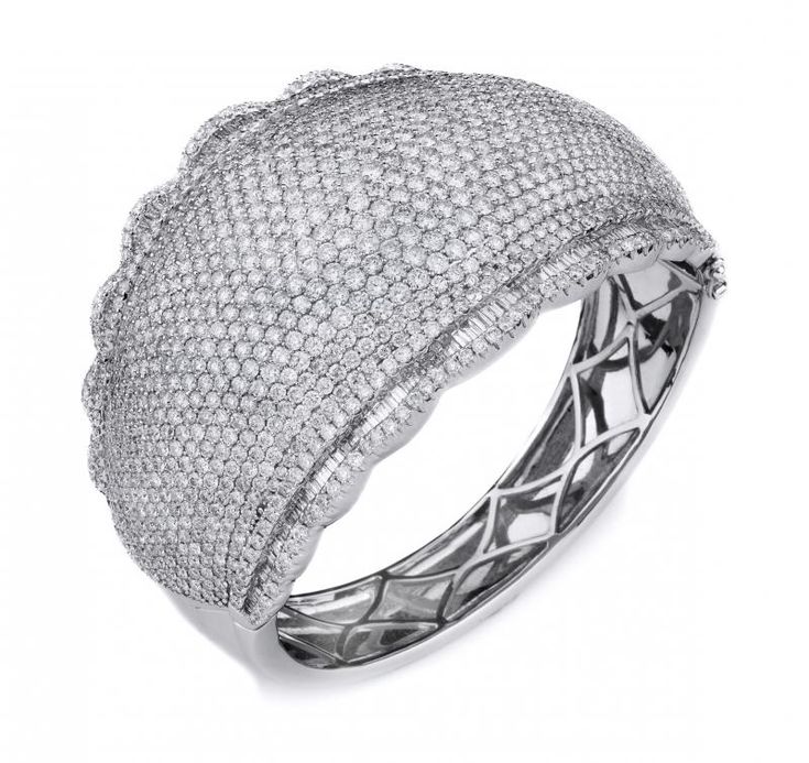 This 18K White Gold Baguette Diamond Rounded Bangle Bracelet features both baguette cut and round brilliant cut Diamonds to add a touch of sparkle to your style. Pink Sapphire Jewelry, Sapphire Jewellery, Number 16, Diamond Bangle, Baguette Cut, Sapphire Jewelry, Baguette Diamond, Round Brilliant Cut Diamond, Pink Sapphire