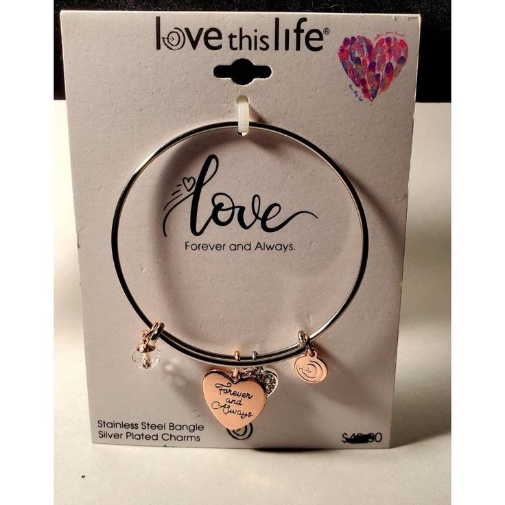 Love This Life Bracelet, Charm Bracelet, Stainless Steel Bangle With Silver Plated Charms. Classic, Stylish And Fun To Wear! Still In Its Original Packaging. Shipping Policy: Items Are Generally Shipped Usps Priority Mail Which Includes A Minimum Of $50 Insurance. All Items Are Carefully Packaged. If An Item Is Damaged During Shipping, Please Take Pictures And Let Me Know Immediately So A Claim Can Be Filed With The Shipper. I Have A Handling Fee That Helps Offset The Bubble Wrap, Peanuts And Other Packaging Materials I Use As I Don't Want Any Accidents. Thus Far, Everything Has Arrived In Beautiful Condition And I Would Like To Keep That Trend Going. If You Want To Purchase Multiple Items Silver Heart Bracelet For Best Friend On Valentine's Day, Silver Heart Bracelet For Best Friend On Mother's Day, Silver Heart Bracelets For Best Friend Gift, Heart-shaped Silver Bracelets For Best Friend Gift, Silver Stainless Steel Heart Bracelet For Friendship, Inspirational Silver Stainless Steel Bracelets, Silver Nickel-free Heart Bracelet For Friendship, Silver Sterling Bracelets For Best Friend Gift, Silver Sterling Silver Bracelet For Best Friend