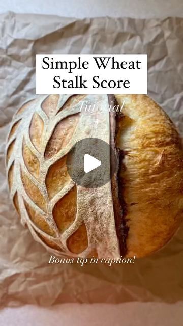 a loaf of bread sitting on top of a piece of paper with the words, simple wheat stalk score