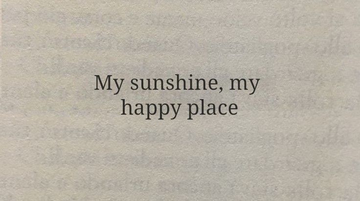 an open book with the words my sunshine, my happy place written in black ink