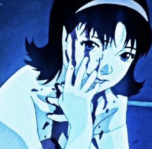 an animated image of a woman holding her hands to her face and looking at the camera