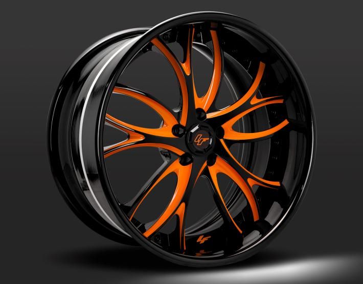 an orange and black wheel with chrome rims on a dark background, 3d rendering