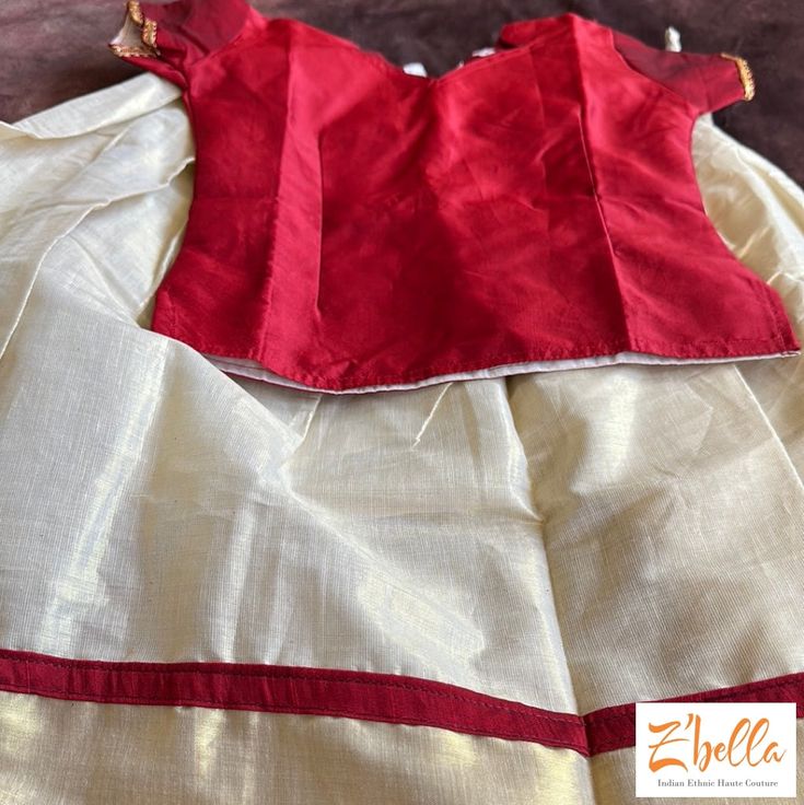 Maroon blouse and cotton tissue skirt Fitted Cotton Set With Long Skirt, Fitted Cotton Sets For Dress-up, Fitted Cotton Sets With Long Skirt, White Cotton Unstitched Blouse Set, Festive Cotton Unstitched Blouse Set, Festive Cotton Set With Unstitched Blouse, Red Cotton Festive Lehenga, Festive Red Cotton Lehenga, Summer Cotton Dress-up Sets