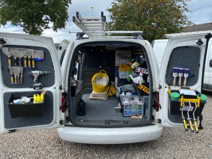 the back end of a van filled with tools