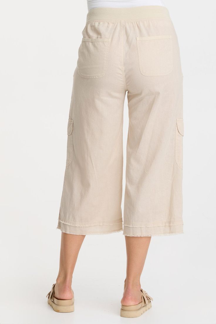 In breathable Cotton Linen, BirkÕs elastic waistband features rib contrast and a drawstring, twill tape-edged front and back pockets, an antique brass bell zipper and matching eyelet details on the front pockets. Cotton Linen: 55/45 Linen/Cotton. 2x1 Rib Waistband: 95/5 Cotton/Spandex Inseam: ~22" Front Rise: ~11.75 Back Rise: ~17.5" Waistband: Drawstring Color Description: Soft cream khaki Preshrunk Machine washable Imported MODEL Veronica is wearing size Small Height: 5'10" | Bust: 34B | Waist Skirt Crop, Brass Bell, Tunic Shirt, One Piece Dress, Fashion Colours, Black Charcoal, Twill Tape, Cropped Leggings, Tee Shop