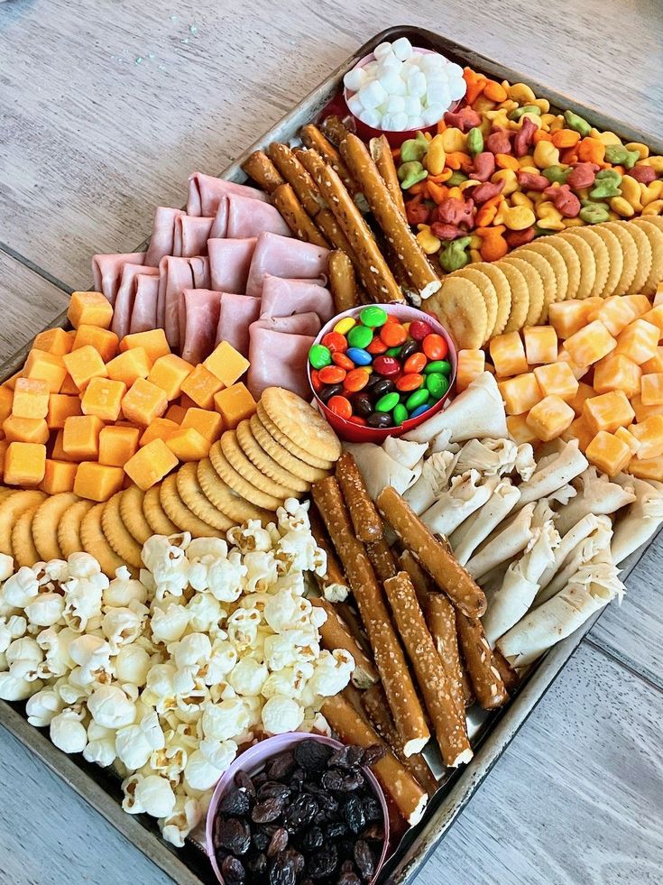 a tray filled with different types of snacks