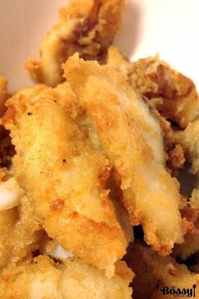 some fried food is sitting in a white bowl