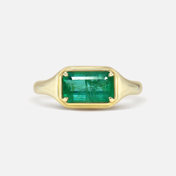 Timeless Emerald-cut Ruby Ring, Timeless Emerald Gemstone Rings, Fine Jewelry With Polished Emerald Finish, Fine Jewelry Emerald Open Ring With Gemstone, Fine Jewelry Emerald Open Ring, Classic Green Open Signet Ring, Timeless Polished Emerald Ring, Fine Jewelry Green Signet Ring With Birthstone, Classic Signet Ring With Rectangular Gemstone