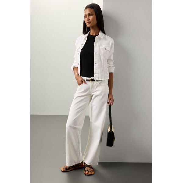 White (81% Cotton, 11% Lyocell, 6% Elasterell-P, 2% Elastane). Jacket. Long sleeves. Front button closure. 20.5" from shoulder to hemline. Imported. Chic Relaxed Fit Denim Jacket For Work, Spring Workwear Long Sleeve Denim Jacket, Spring Long Sleeve Denim Jacket For Workwear, Spring Workwear Denim Jacket, Single Breasted, Single Breasted Denim Jacket For Spring Workwear, Spring Workwear Single-breasted Denim Jacket, Spring Single-breasted Denim Work Jacket, Elegant Fall Denim Jacket For Workwear, Elegant Long Sleeve Denim Jacket For Work